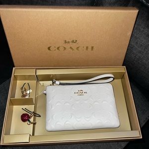 BRAND NEW WITH BOX COACH WRISTLET WITH CHARMS